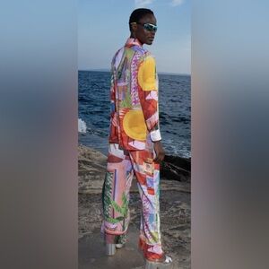 Colorful Women's Jumpsuit with mother of pearl necklace